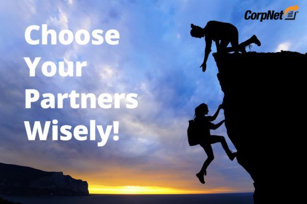 Mountain climbers with text overlay of "choose our partners wisely"